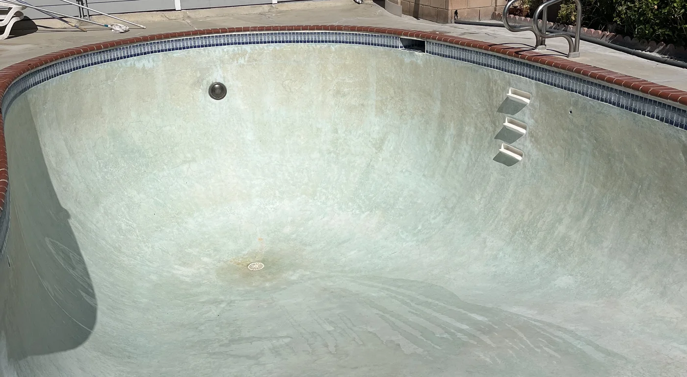 Swimming pool with clean plaster surface after a professional acid wash