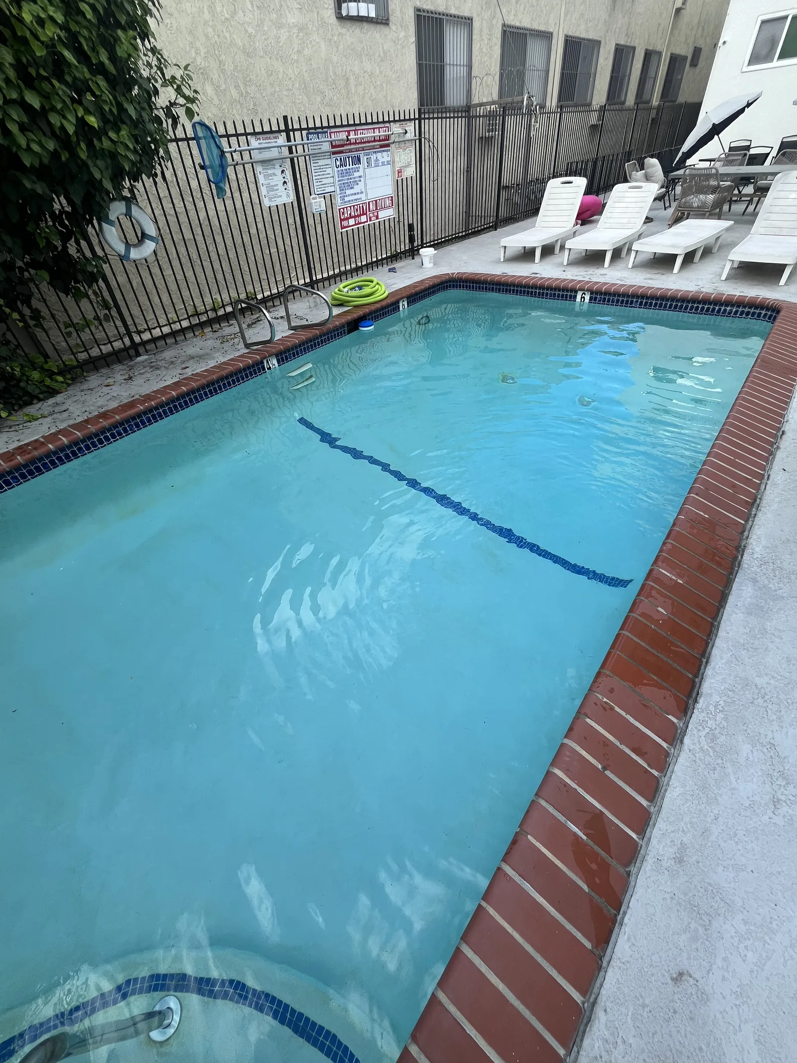 Backyard swimming pool serviced by GK Swimming Pools in Granada Hills, CA