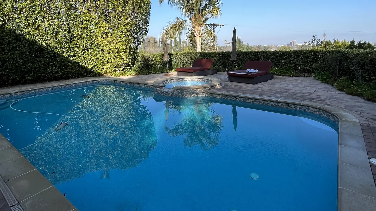 Backyard swimming pool serviced by GK Swimming Pools in Sherman Oaks, CA